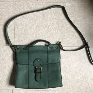 Dark teal Fossil bag with key pendant
